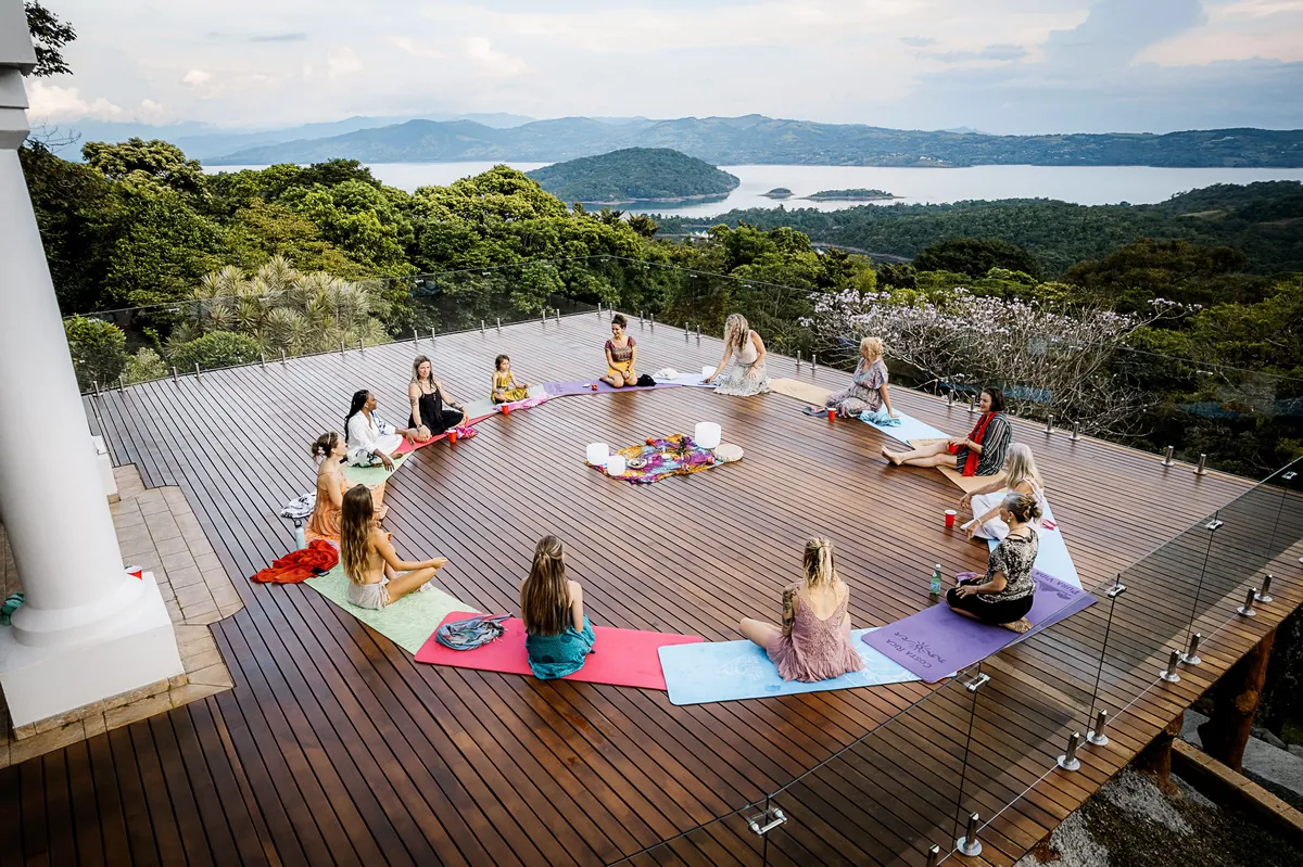 Yoga class on the deck above Lake Arenal